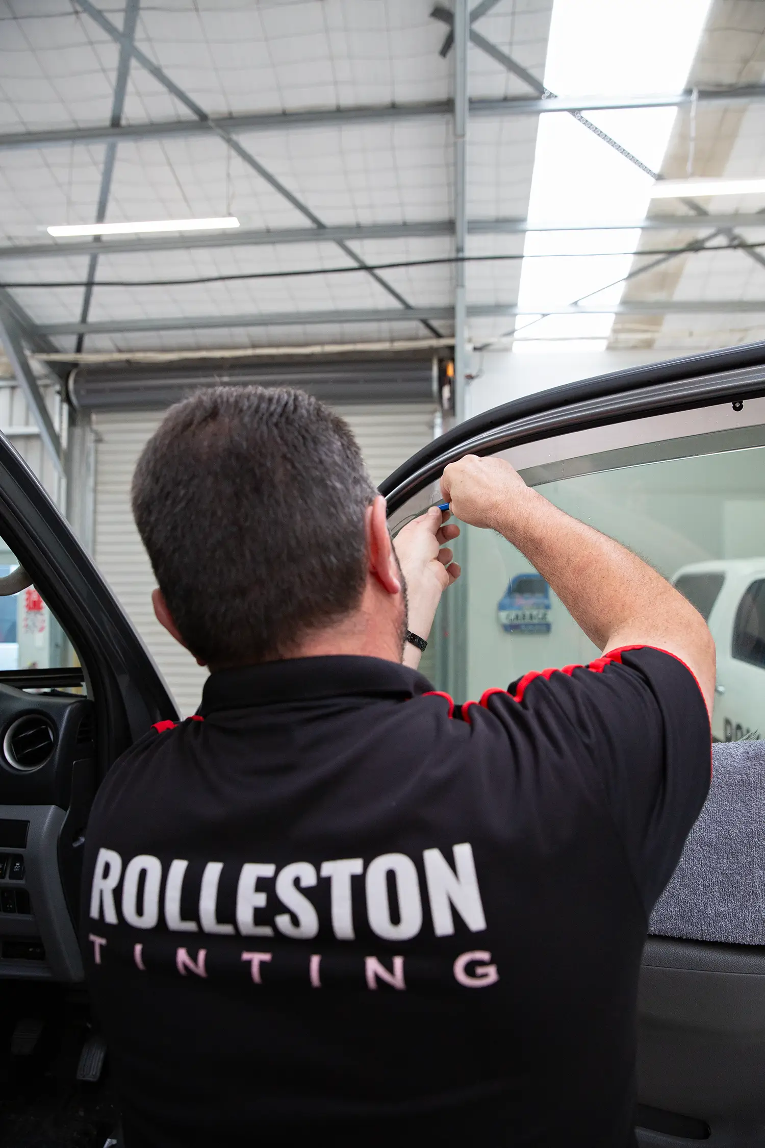 Rolleston Tinting workshop team available for window tinting and wrapping enquiries